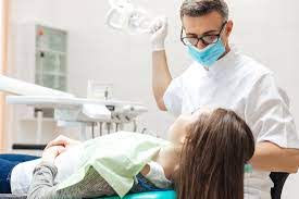 What dentists are qualified to place dental implants?